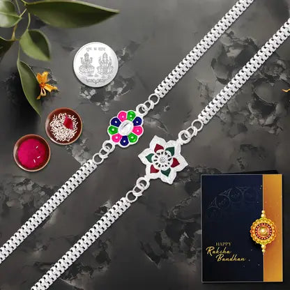 Rakhi Gift Combo With 2 Stylish Floral Rakhis For Brother  Includes Silver Coin Roli Chawal  Greeting Card